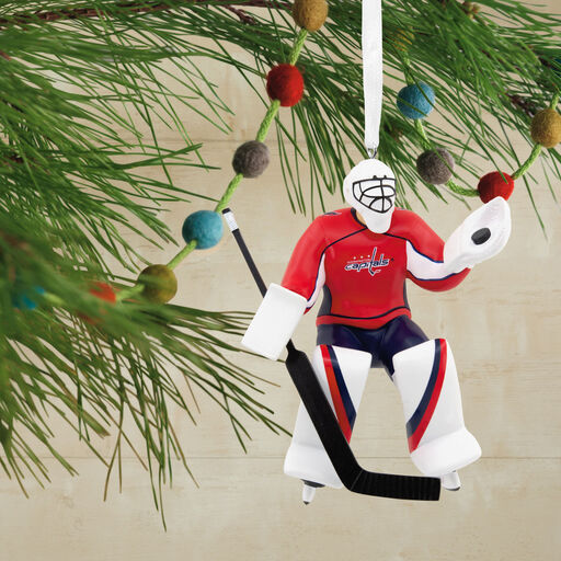 https://www.hallmark.com/dw/image/v2/AALB_PRD/on/demandware.static/-/Sites-hallmark-master/default/dw12b7cf73/images/finished-goods/products/1OSL1880/NHL-Washington-Capitals-Goalie-Christmas-Ornament_1OSL1880_02.jpg?sw=512&sh=512&sm=fit