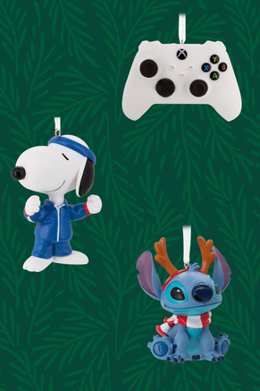 An Xbox controller ornament, Snoopy ornament and Stitch ornament