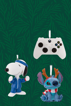 An Xbox controller ornament, Snoopy ornament and Stitch ornament