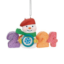 An ornament featuring a snowman and the year 2024